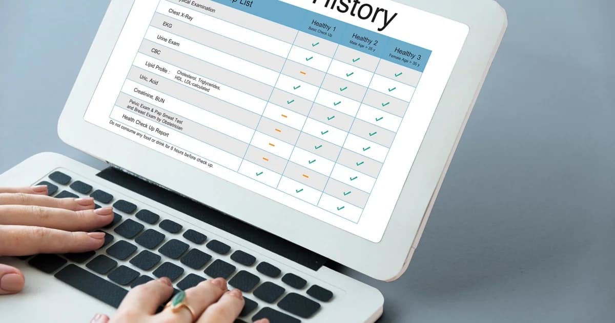 Médico analisando um gráfico de DRE em um tablet, representando a gestão financeira de uma clínica médica.